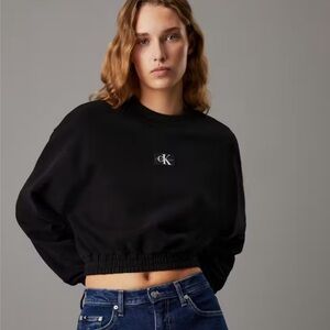 Calvin Klein Cropped Cotton Terry Sweatshirt in black size S with CK Logo